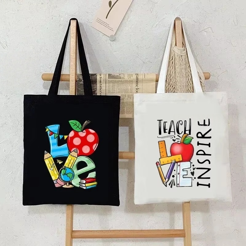 女性キャンバスショルダーバッグティーチラブインスパイアプリン - Canvas Tote Bag のレビューと価格